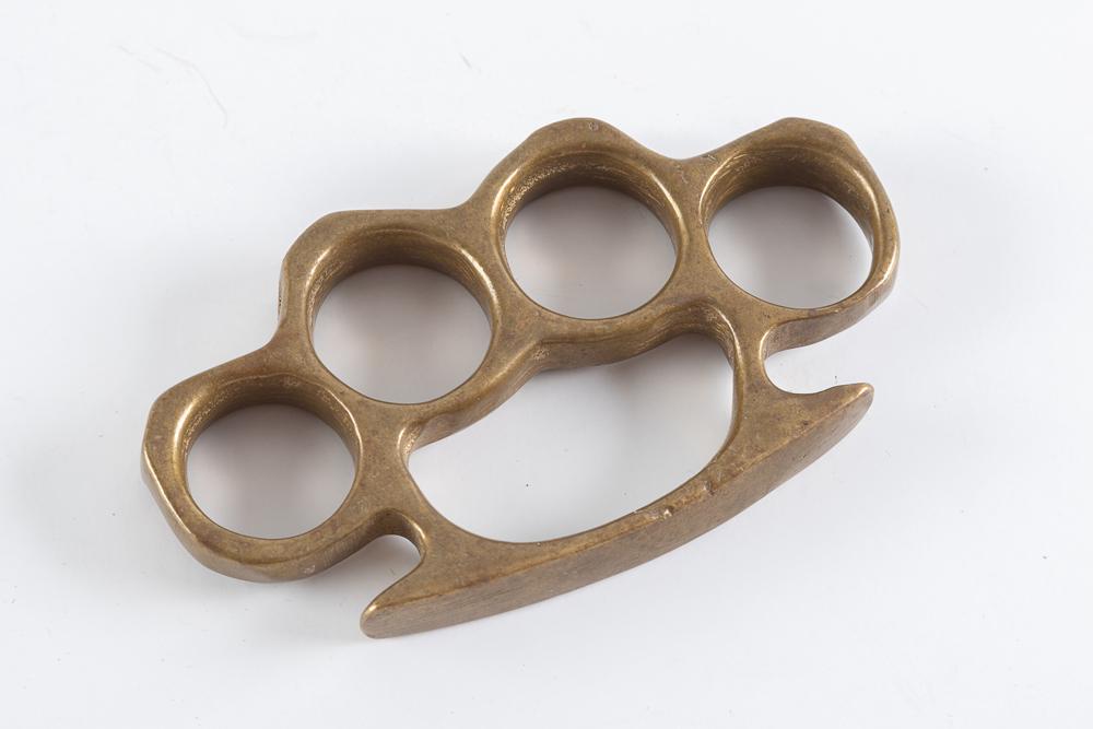 Vintage heavy Brass Knuckles. They are larger than most measuring 4 1/2" overall width and 2 1/2": Vintage heavy Brass Knuckles. They are larger than most measuring 4 1/2" overall width and 2 1/2" tall.