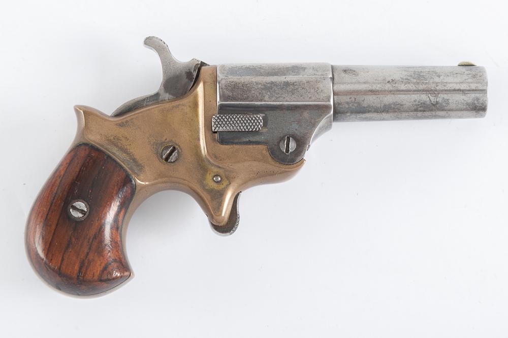 Antique, C.H. Ballard single shot, .41 caliber Derringer, SN 2193, manufactured circa 1870s in: Antique, C.H. Ballard single shot, .41 caliber Derringer, SN 2193, manufactured circa 1870s in quantities totaling only a few thousand. The barrel is marked "Ballard" on top with the address on the si