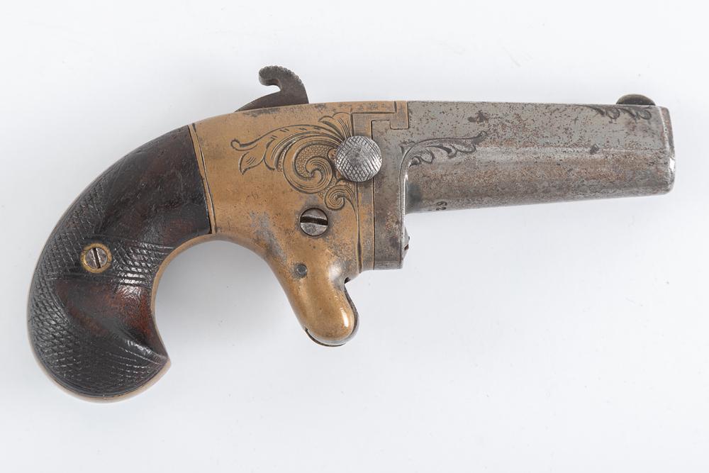 Antique National Arms Co., No. 2 Derringer in .41 caliber, SN BH22, manufactured circa 1865-1870,: Antique National Arms Co., No. 2 Derringer in .41 caliber, SN BH22, manufactured circa 1865-1870, until the company was purchased by Colt. This is a single shot Derringer with a 2 1/2" barrel. There a