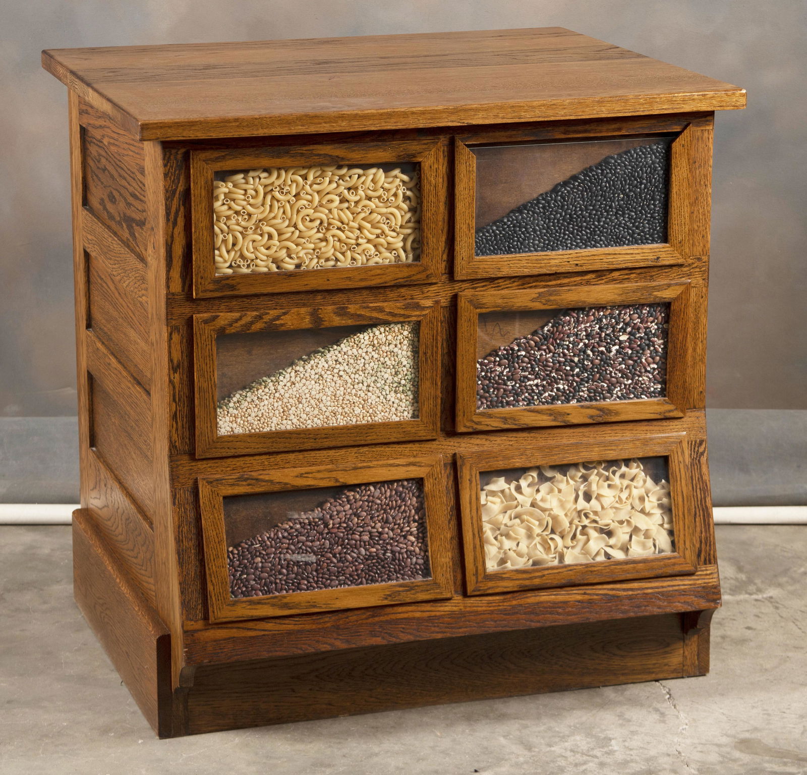 Antique oak, country store Seed Cabinet in very desirable size with six storage drawers in back and: Antique oak, country store Seed Cabinet in very desirable size with six storage drawers in back and Sears style cast iron hardware, six removable display windows in front, excellent finish and conditi