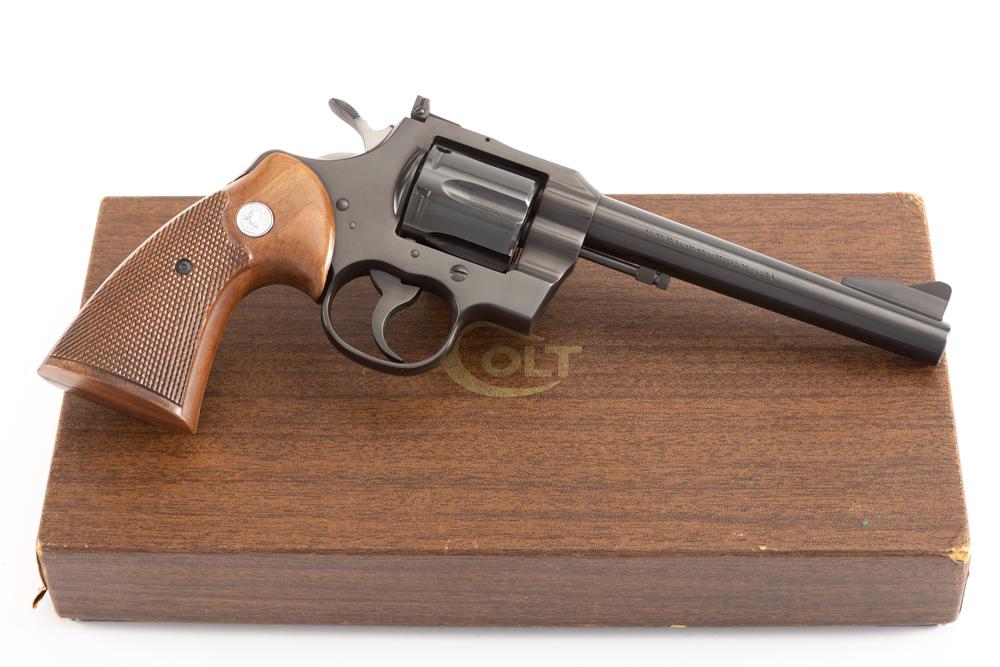 New in Box Colt, Trooper Model, double action Revolver, .357 MAG caliber, SN 71830, blue finish, 6": New in Box Colt, Trooper Model, double action Revolver, .357 MAG caliber, SN 71830, blue finish, 6" barrel, walnut checkered grips with silver Colt Medallions. Sold in original "Colt" marked factory b