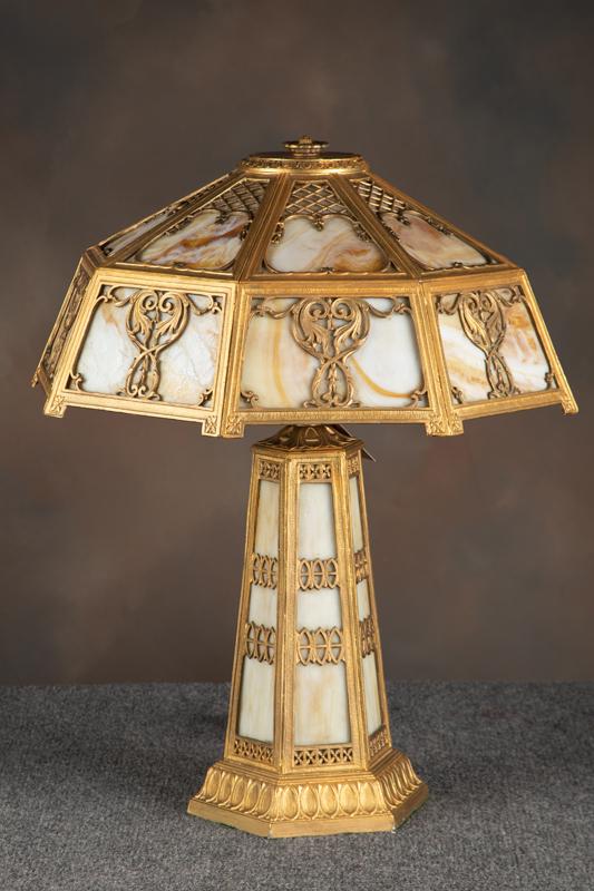 Antique Panel Lamp, circa 1920-1925, with 18 1/2" octagon shaped slag glass shade and matching base,: Antique Panel Lamp, circa 1920-1925, with 18 1/2" octagon shaped slag glass shade and matching base, attributed to Chicago Lamp Co. Lamp measures 25" tall.