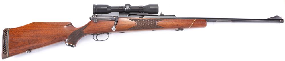 Mauser Model 66 Rifle, SN G32413, chambered in .338 WIN MAG caliber, topped with a Zeiss Diatal 4x32: Mauser Model 66 Rifle, SN G32413, chambered in .338 WIN MAG caliber, topped with a Zeiss Diatal 4x32 Scope with quick release flip up scope mount which allows use of the front and rear open sights.