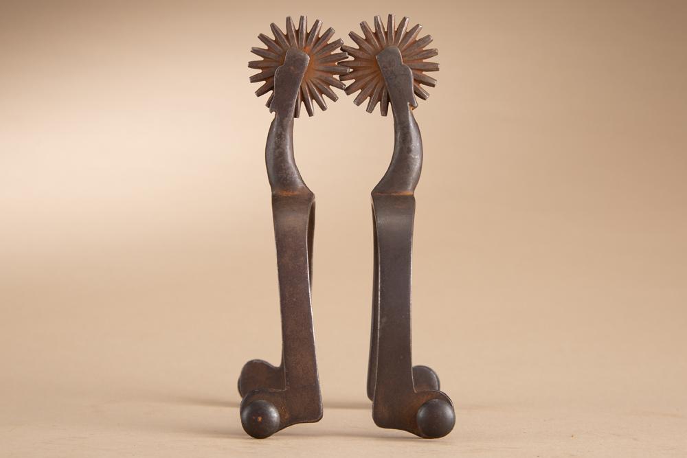 Pair of "G.A Bischoff & CO." marked single mounted Spurs, G.A. Bischoff (1862-1944) marked inside: Pair of "G.A Bischoff & CO." marked single mounted Spurs, G.A. Bischoff (1862-1944) marked inside heel bands. Spurs have silver overlay and eagle head shanks, untouched condition.