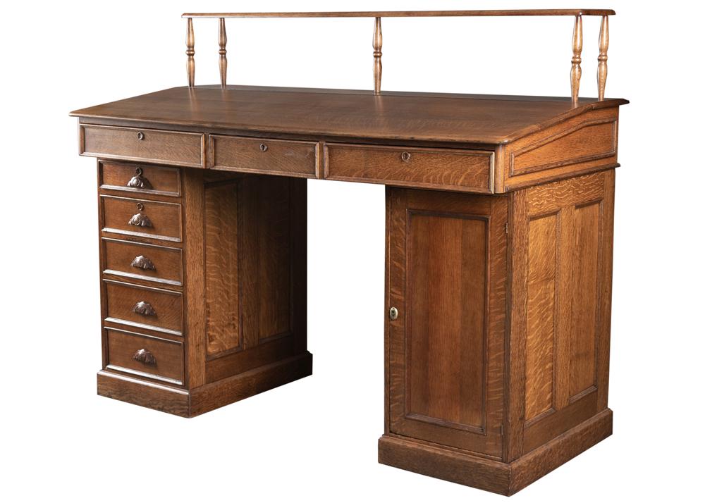 High condition, slant front, Railroad Dispatch Desk, quarter sawn oak, circa 1900, factory designed: High condition, slant front, Railroad Dispatch Desk, quarter sawn oak, circa 1900, factory designed to come in three pieces for easy moving. Left hand column has five drawers with carved pulls. Right 