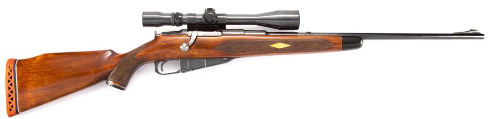 Custom Mosin-Nagant Bolt Action Rifle, 7.62x54 caliber, SN 2606, 24" barrel, blue finish with: Custom Mosin-Nagant Bolt Action Rifle, 7.62x54 caliber, SN 2606, 24" barrel, blue finish with engraved stag on barrel and floral engraving on bolt and receiver. Has initials "BAS" on the bottom of mag