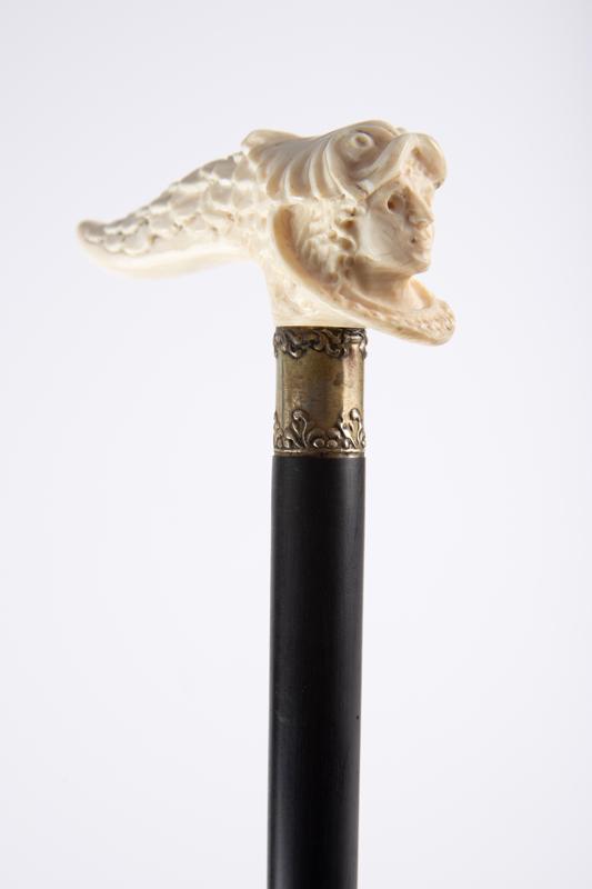 Wooden character Cane, 38 1/2" long with embossed silver spacer, dolphin and ladies head handle.: Wooden character Cane, 38 1/2" long with embossed silver spacer, dolphin and ladies head handle. KING COLLECTION