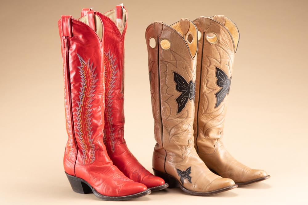 This lot will consist of two pair of Ladies Boots. One pair by Larry Mahan, the other pair are: This lot will consist of two pair of Ladies Boots. One pair by Larry Mahan, the other pair are Justin. The Mahan's have 19" tops and are size 8. The Justins have 17 1/2" tops and are 6 1/2B. Boots are