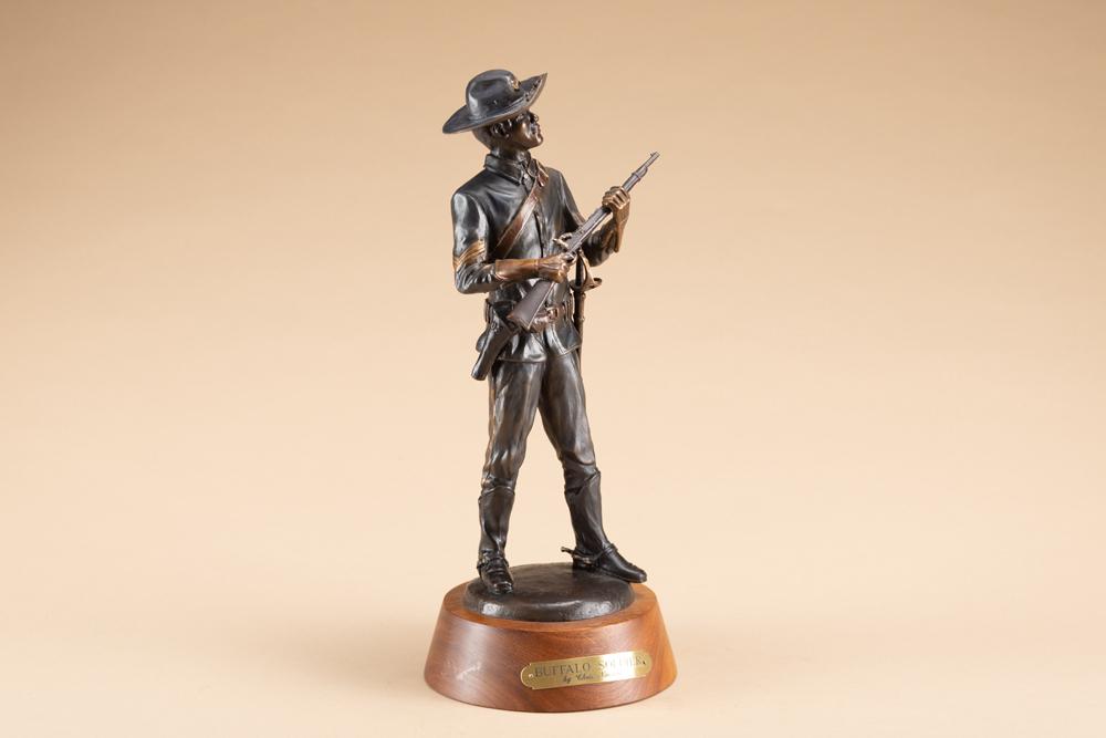 Bronze Sculpture by noted artist Chris Navarro, titled "Buffalo Soldier" #18/250, cast in 2003,: Bronze Sculpture by noted artist Chris Navarro, titled "Buffalo Soldier" #18/250, cast in 2003, measures 15" overall on a 2" base. Great detail, nice bronze patina. Chris Navarro (b. 1956) from Wyomin