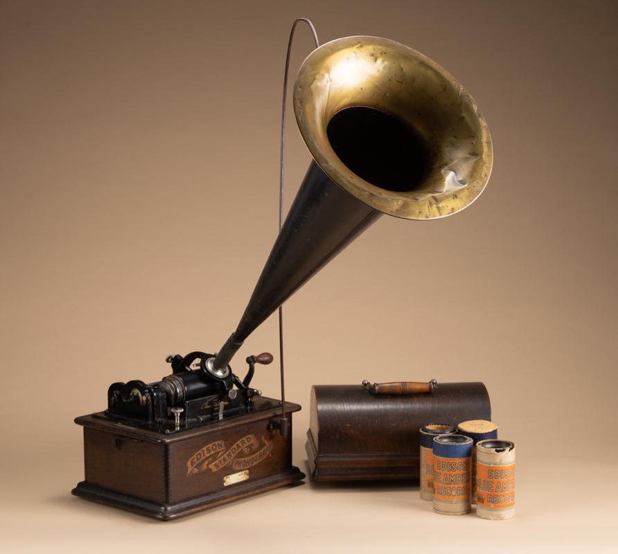 Antique, oak case, Edison Standard Cylinder Phonograph in Beehive case with metal and brass horn,: Antique, oak case, Edison Standard Cylinder Phonograph in Beehive case with metal and brass horn, complete with crane, circa 1900, in original finish, celluloid label marked "The Edisonia Co., Newark,