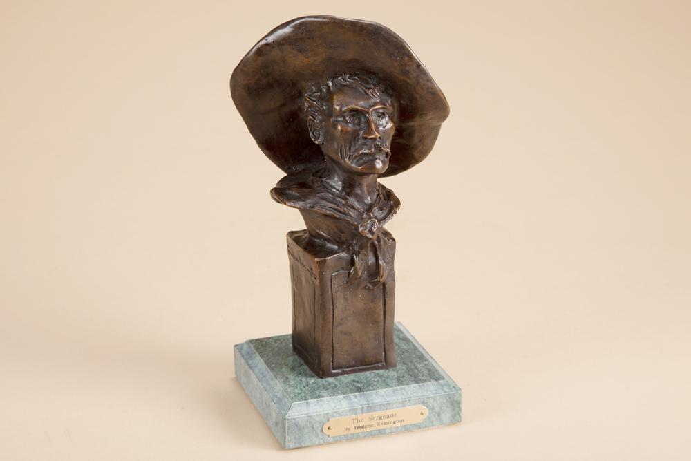 Bronze Sculpture on marble base, brass label titles it "The Sergeant", by Frederic Remington, 10": Bronze Sculpture on marble base, brass label titles it "The Sergeant", by Frederic Remington, 10" tall x 5" square marble base.