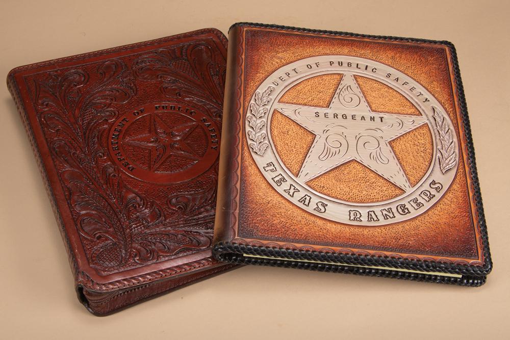 This lot consists of two items to include: (1) Hand tooled Binder, nicely tooled in center: This lot consists of two items to include: (1) Hand tooled Binder, nicely tooled in center "Department of Public Safety" in circle star. Unused condition. NOTE: On back is a steer head Revolver with b