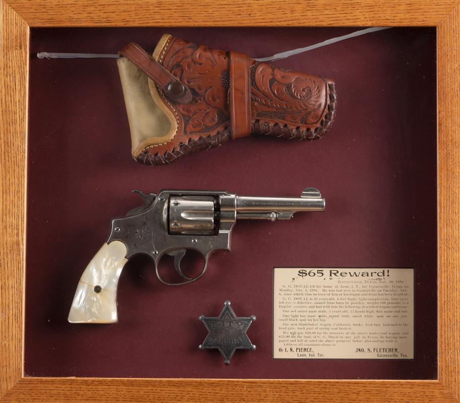 Framed collection of items to include: A S&W Model MP Double Action Revolver, .38 S&W SPL caliber,: Framed collection of items to include: A S&W Model MP Double Action Revolver, .38 S&W SPL caliber, SN 260982, retains much of its original nickel finish, 4" barrel, mother of pearl grips showing hairl