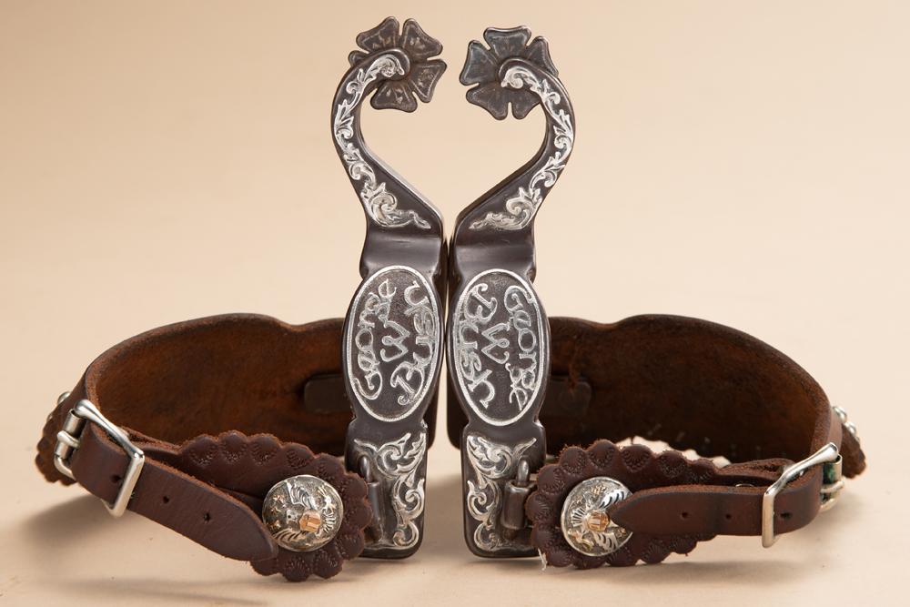 Fine custom made pair of sterling double mounted Spurs by noted Texas Bit and Spur Maker Wes: Fine custom made pair of sterling double mounted Spurs by noted Texas Bit and Spur Maker Wes Griffin. Spurs are hand engraved on one side "George W. Bush" with Presidential hand engraved swing buttons