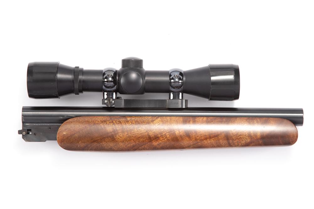 12" Barrel for a Thompson Contender in a .357 MAG Match caliber, accompanied by a wooden forend and: 12" Barrel for a Thompson Contender in a .357 MAG Match caliber, accompanied by a wooden forend and a Simmons 4X Handgun Scope. Good condition.