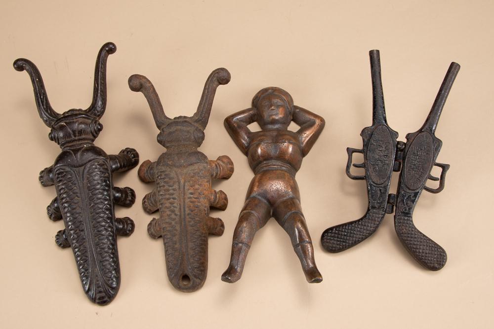 Group of 4 early cast iron Boot Jacks including two Beetle Bugs, one folding Double Barrel Boot: Group of 4 early cast iron Boot Jacks including two Beetle Bugs, one folding Double Barrel Boot Jack, and one Naughty Nelly. Will be sold 4 X the bid. KING COLLECTION