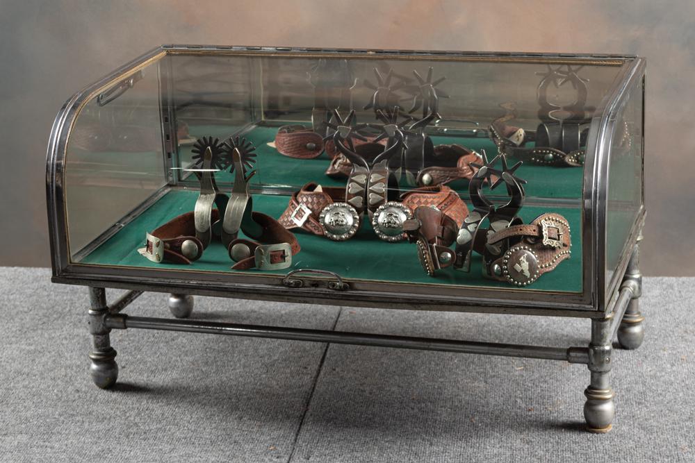 Unusual vintage curved glass lift top Display Case, extremely well made with locking top, measures: Unusual vintage curved glass lift top Display Case, extremely well made with locking top, measures 31 1/4" wide x 18" deep x 18" tall, nickel finish, overall very good condition. Would make a perfect