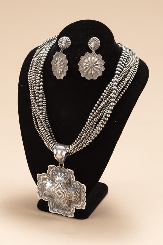 Beautiful hand stamped "Sterling" marked Cross Necklace with 10 graduated beaded strands accompanied: Beautiful hand stamped "Sterling" marked Cross Necklace with 10 graduated beaded strands accompanied by matching Earrings. Will be sold as one lot.