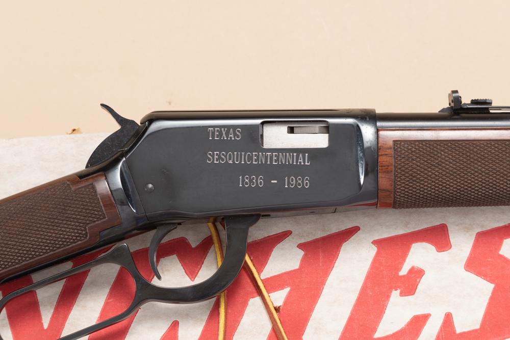 Like new in box Winchester Texas Sesquicentennial 1836-1986 Lever Action Rifle, Model 1422 XTR, .22: Like new in box Winchester Texas Sesquicentennial 1836-1986 Lever Action Rifle, Model 1422 XTR, .22 LR caliber, SN F513643, high gloss blue finish, 20" round barrel with full magazine, walnut stock wi