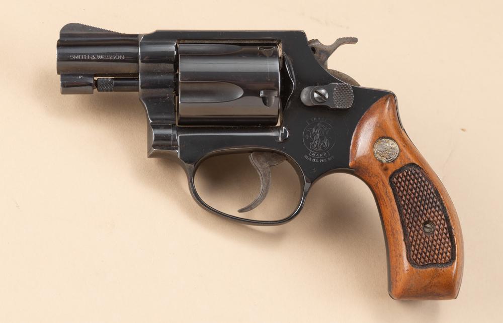 Smith & Wesson Model 36 Double Action Revolver, .38 SPL caliber, SN ABA2539, excellent high polish: Smith & Wesson Model 36 Double Action Revolver, .38 SPL caliber, SN ABA2539, excellent high polish blue finish, 2" barrel, walnut checkered grips, overall very good condition. (MODERN)