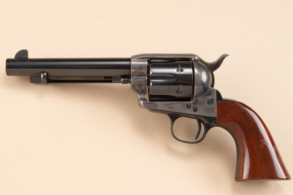 High condition Cimmaron Single Action Revolver, .45 caliber, SN 166359, blue finish with case: High condition Cimmaron Single Action Revolver, .45 caliber, SN 166359, blue finish with case hardened frame, 5 1/2" barrel with one piece wooden grips. (MODERN)