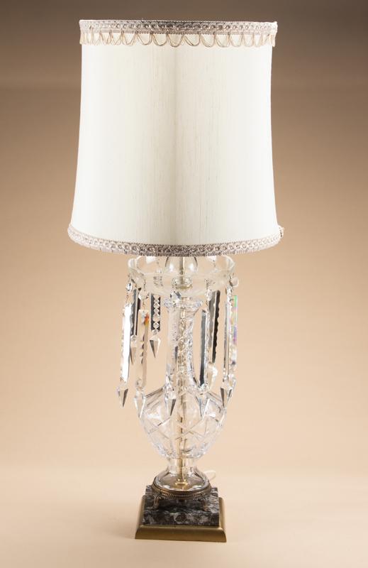 A beautiful Crystal Lamp with hand cut prisms, circa 1940s, with onyx base, crystal portion of this: A beautiful Crystal Lamp with hand cut prisms, circa 1940s, with onyx base, crystal portion of this lamp measures 22" tall with shade. One prism is missing from this lamp. From Prominent Brenham, Texa