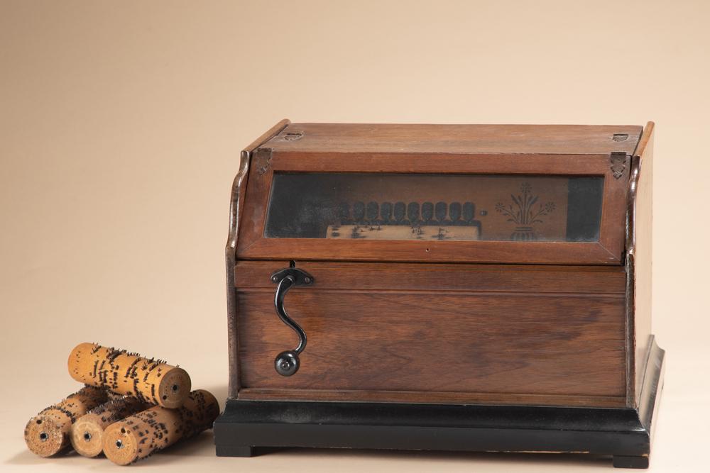 Antique Roller Organ, circa 1890-1900, nicknamed "COB" player because of how the rolls were shaped.: Antique Roller Organ, circa 1890-1900, nicknamed "COB" player because of how the rolls were shaped. Machine makes sound but needs adjusting. 18" wide x 15" deep x 12 1/4" tall. Comes with five music C