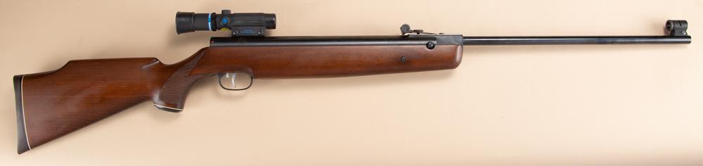 Nice condition "Beeman" marked Precision Air Gun Model R1. This gun shoots a .177 caliber Pellet,: Nice condition "Beeman" marked Precision Air Gun Model R1. This gun shoots a .177 caliber Pellet, one piece wooden stock, mounted with a Beeman Blue Ribbon Model SS1 Scope 2.5x16. Adjustable sights, a