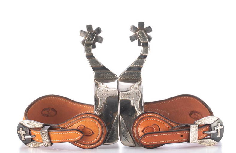Pair of single mounted Spurs, 77, made by noted Pampa, Texas Bit and
