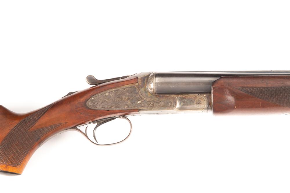 LC Smith Ideal Grade Side By Side Shotgun 12 gauge, SN FWS 20777, manufactured 1947, blue finish,: LC Smith Ideal Grade Side By Side Shotgun 12 gauge, SN FWS 20777, manufactured 1947, blue finish, 30" barrels, case hardened receiver showing most of the original colors, select automatic ejectors, Hu