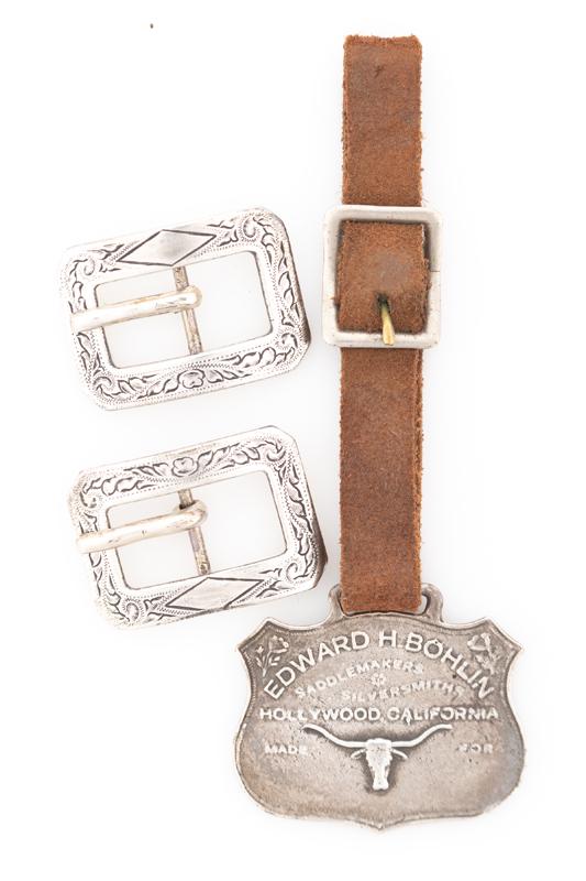 Group of "Bohlin" marked sterling items to include: A sterling shield shaped Watch Fob with raised: Group of "Bohlin" marked sterling items to include: A sterling shield shaped Watch Fob with raised steer head advertising Edward H. Bohlin, Hollywood, California, complete with leather watch strap; A