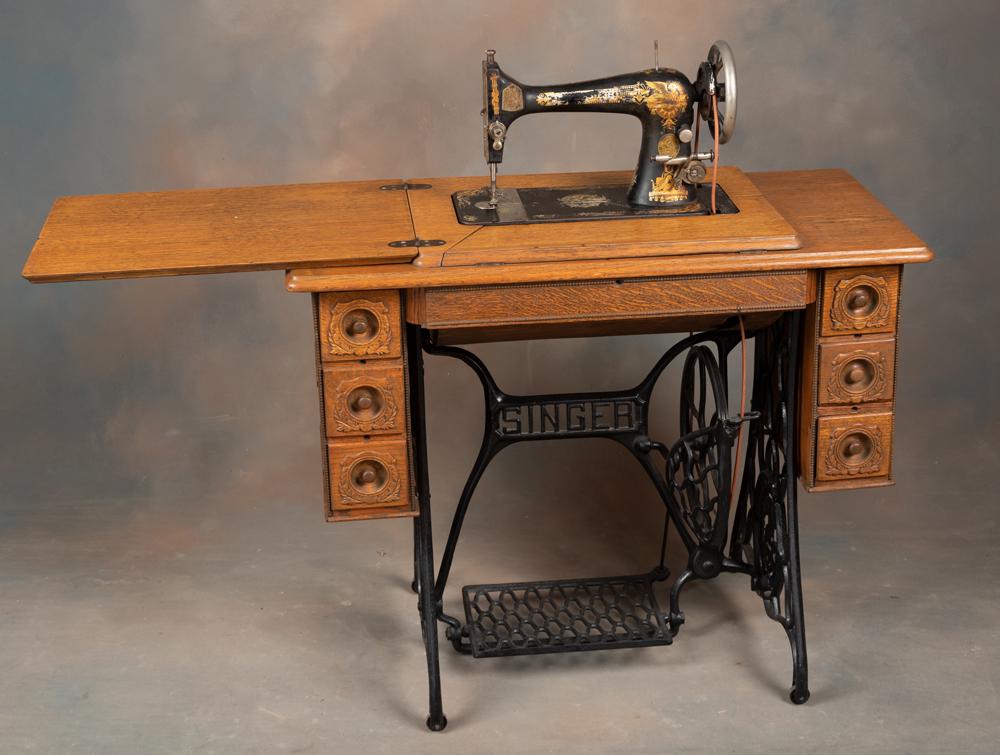 Antique oak case Singer Sewing Machine, complete with 6-drawer storage compartments in front, good: Antique oak case Singer Sewing Machine, complete with 6-drawer storage compartments in front, good overall condition. KING COLLECTION