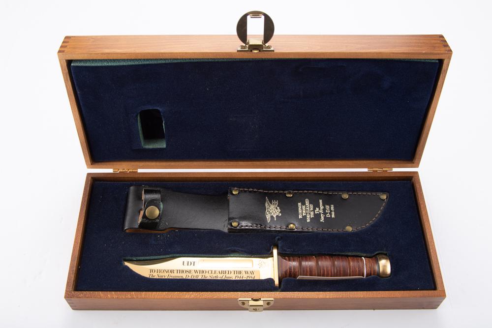 This lot consists of three cased Commemorative Knives by Wenoka to include: A cased Scuba Diving: This lot consists of three cased Commemorative Knives by Wenoka to include: A cased Scuba Diving Knife commemorating fifty years, 1943-1993, SN 0256, 7 3/8" blade, unused in fitted box; A cased Diving