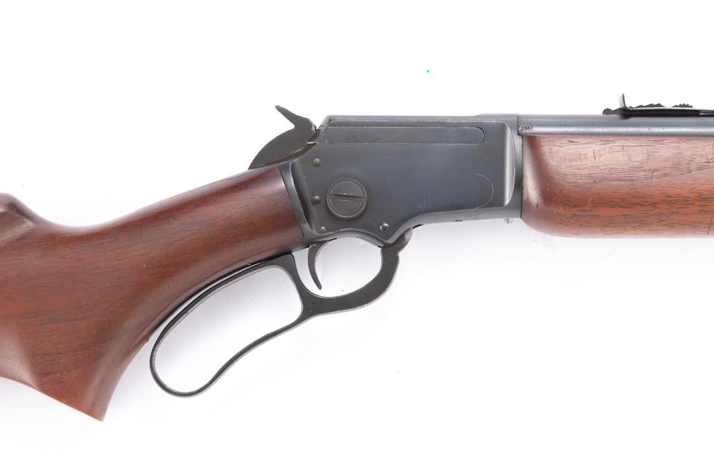 Marlin Model 39A Lever Action Carbine, .22 caliber, SN J6800, blue finish, 24" round barrel, walnut: Marlin Model 39A Lever Action Carbine, .22 caliber, SN J6800, blue finish, 24" round barrel, walnut stock, very good condition, retains most all its blue finish, original buttplate, adjustable rear si
