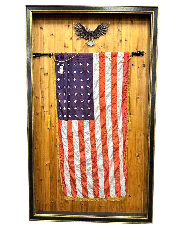 Beautiful large custom framed American Flag. Flag shows only 48 stars. Flag is designed to be held: Beautiful large custom framed American Flag. Flag shows only 48 stars. Flag is designed to be held by winged eagle at crest. Frame measures 89 1/2" x 53". Would make a great entrance piece. KING COLLE