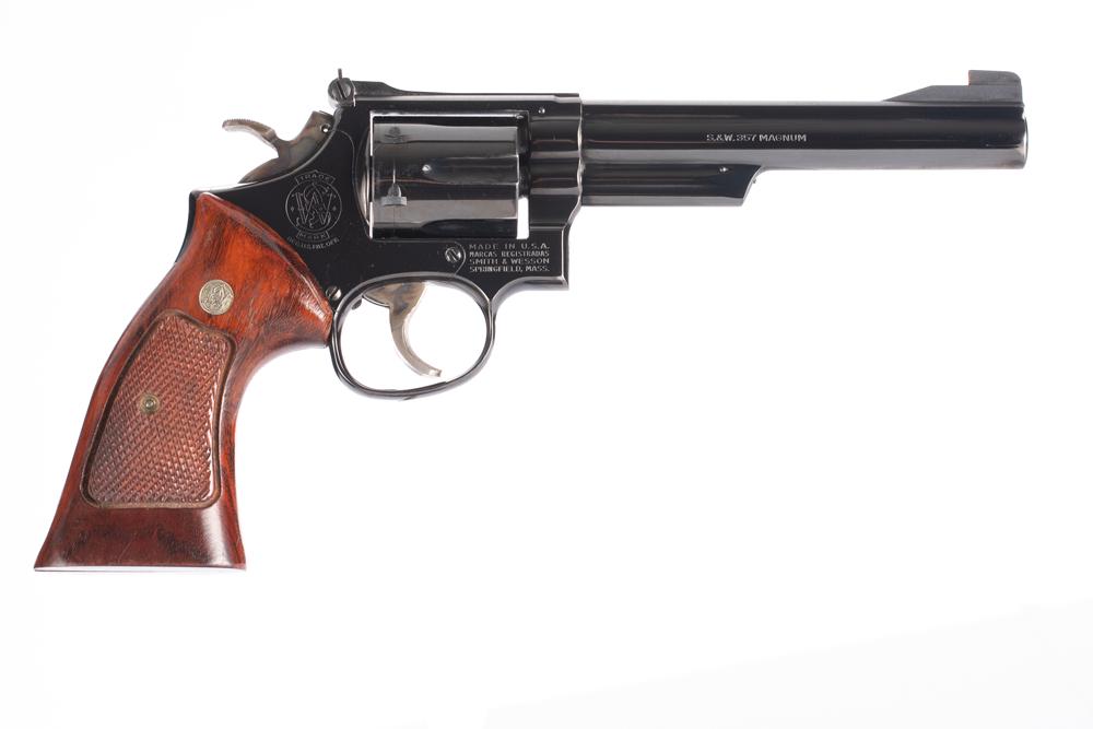 Fine Smith & Wesson Model 19-4 Double Action Revolver, .357 MAG caliber, SN 38K6965. Bright original: Fine Smith & Wesson Model 19-4 Double Action Revolver, .357 MAG caliber, SN 38K6965. Bright original finish with light turn line, 6" pinned barrel, with target hammer and trigger. Revolver has wooden