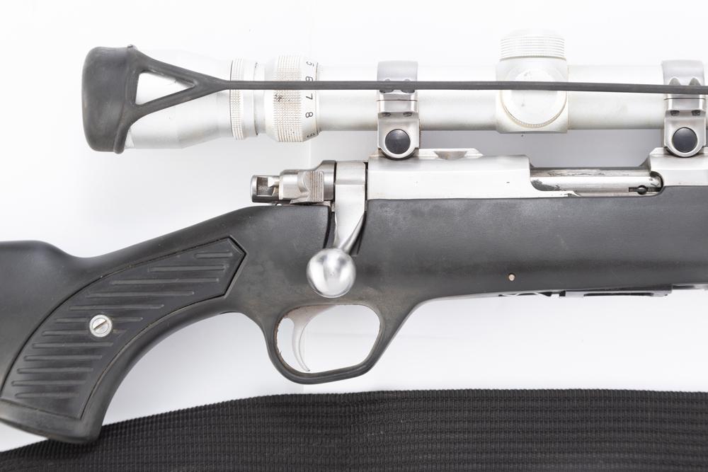 Ruger Model 77/22 Bolt Action Rifle, 22 LR caliber, SN 702-23096, stainless, 20" barrel, "Ruger": Ruger Model 77/22 Bolt Action Rifle, 22 LR caliber, SN 702-23096, stainless, 20" barrel, "Ruger" marked composite stock, mounted with a stainless Simmons scope with lens protector. Complete with swive