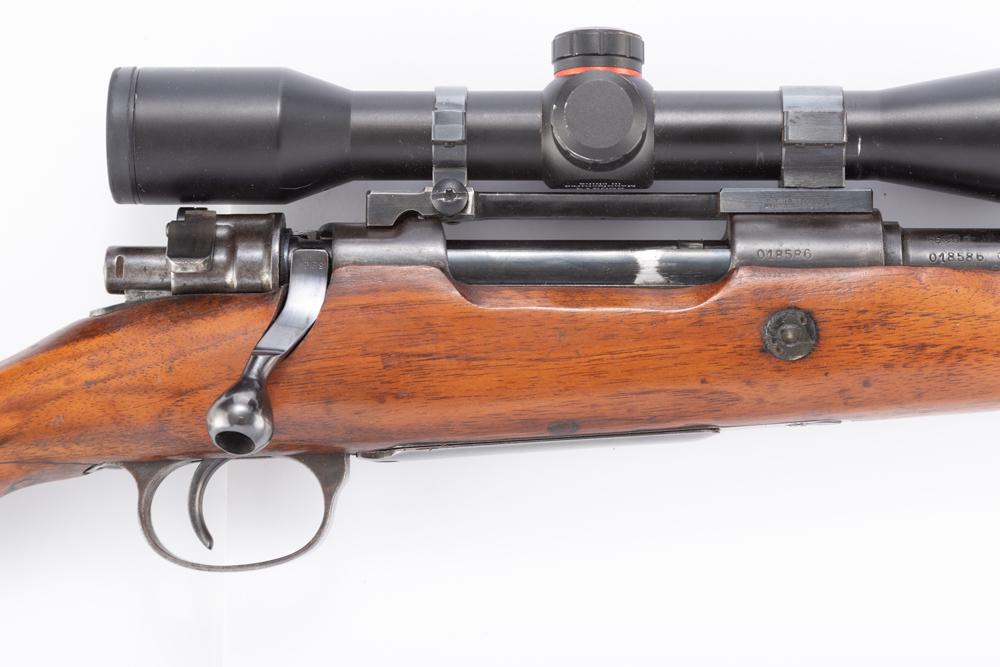 Fabrique Nationale Model 98 Mauser Bolt Action Rifle, 7x57 caliber, SN 018586, blue finish, 18": Fabrique Nationale Model 98 Mauser Bolt Action Rifle, 7x57 caliber, SN 018586, blue finish, 18" barrel, wood stock with some handling marks, smooth action, bore is good. Mounted with a Simmons 4x32 sc