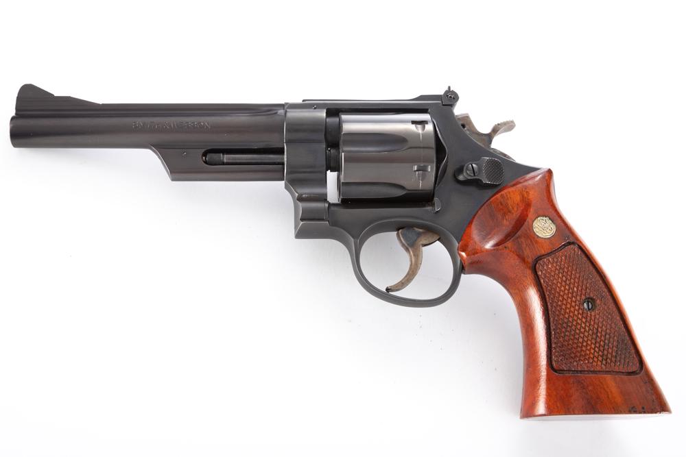 Smith & Wesson Model 28-2 Double Action Revolver Highway Patrolman, .357 caliber, SN N592681, blue: Smith & Wesson Model 28-2 Double Action Revolver Highway Patrolman, .357 caliber, SN N592681, blue finish, 5 1/2" pinned barrel, excellent condition, retains majority of original finish with wooden ch