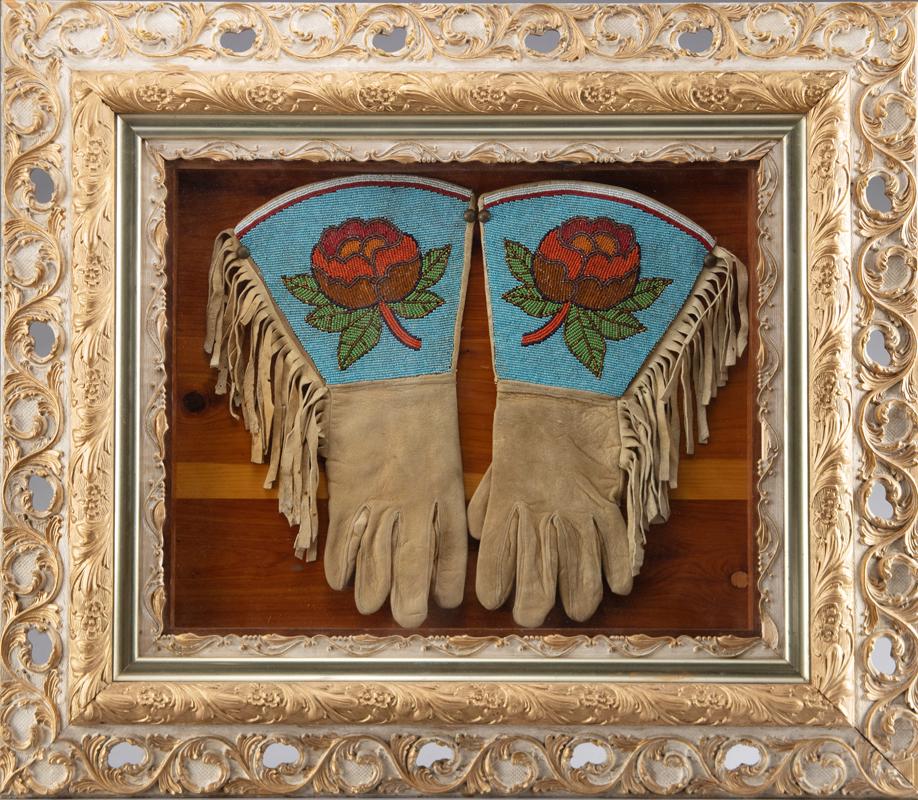 Framed pair of antique beaded and fringed doe skin Wild West Gauntlets, appear to be in very good: Framed pair of antique beaded and fringed doe skin Wild West Gauntlets, appear to be in very good condition, mounted in an antique shadow box frame that measures 26" x 30".