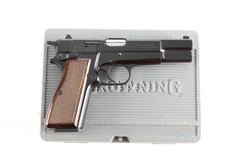 Like new in box Belgium Browning HP Semi-Automatic Pistol, 9 mm, SN 245NX61545, excellent blue: Like new in box Belgium Browning HP Semi-Automatic Pistol, 9 mm, SN 245NX61545, excellent blue finish, 4 1/2" barrel, original factory checkered grips. Sold in factory fitted hard case with extra maga