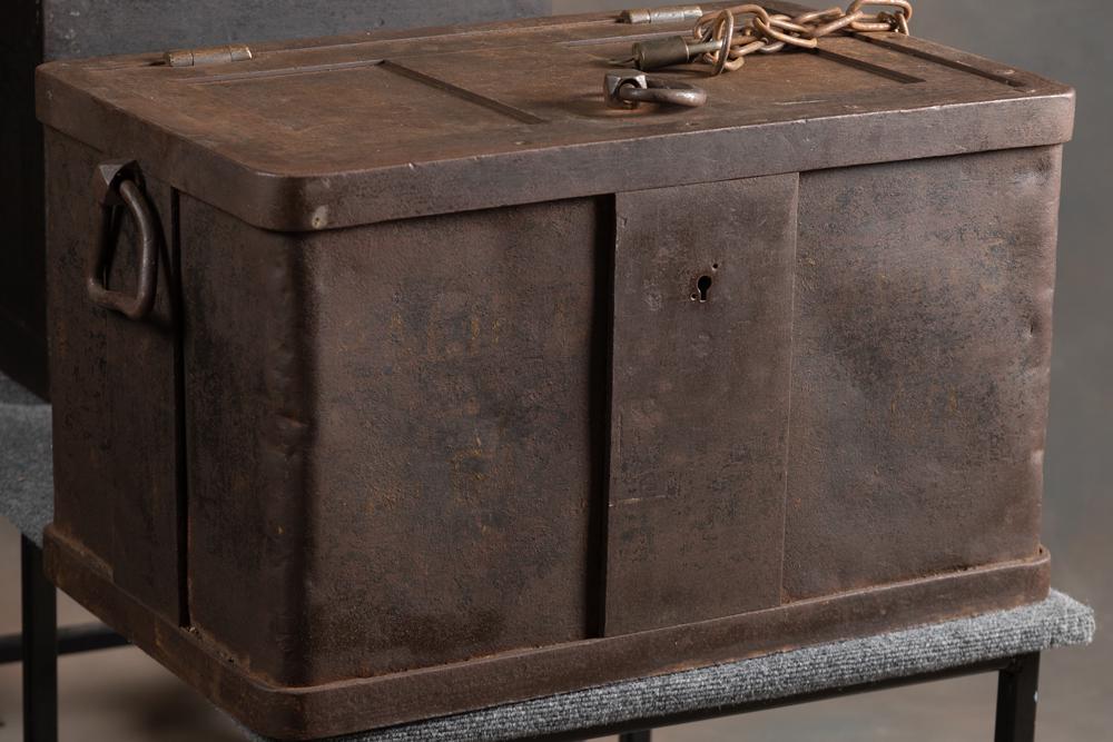 Large antique iron shipping Strong Box marked "Pacific Express", faint traces of original stenciling: Large antique iron shipping Strong Box marked "Pacific Express", faint traces of original stenciling on front, with double handles, chain and brass lock. Strong Box measures 27" L x 17" W x 16" T with