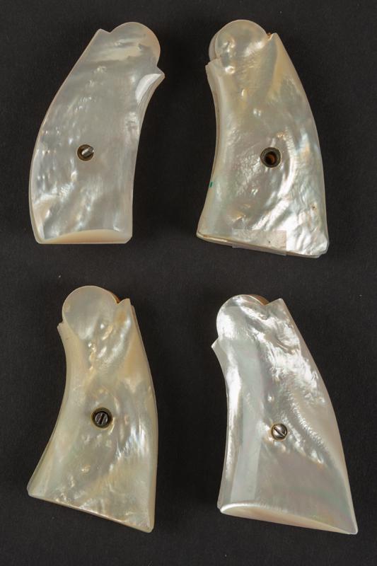 Group of four (4) sets of Mother of Pearl two-piece Grips for Smith & Wesson small and medium frame: Group of four (4) sets of Mother of Pearl two-piece Grips for Smith & Wesson small and medium frame revolvers, believed to be sizes for J & K models. GROUP SOLD AS ONE LOT. BUDDY KING COLLECTION