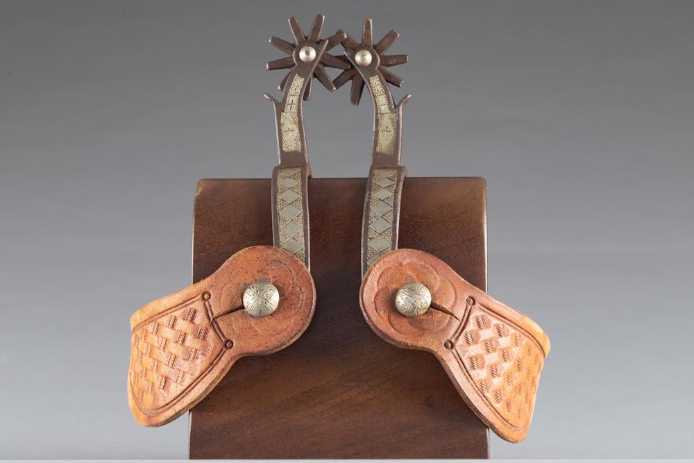 Pair of Canon City double mounted Spurs showing typical style prison inlay, untouched condition with: Pair of Canon City double mounted Spurs showing typical style prison inlay, untouched condition with etched buttons and chap guards.