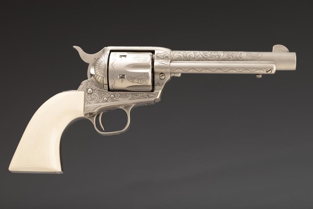 Engraved Colt Single Action Army Revolver, SN SA29282, manufactured circa 1979. This is a .44 S & W: Engraved Colt Single Action Army Revolver, SN SA29282, manufactured circa 1979. This is a .44 S & W SPL and .44 Russian caliber, 6-shot revolver with a 5 1/2” barrel, satin nickel finish and one