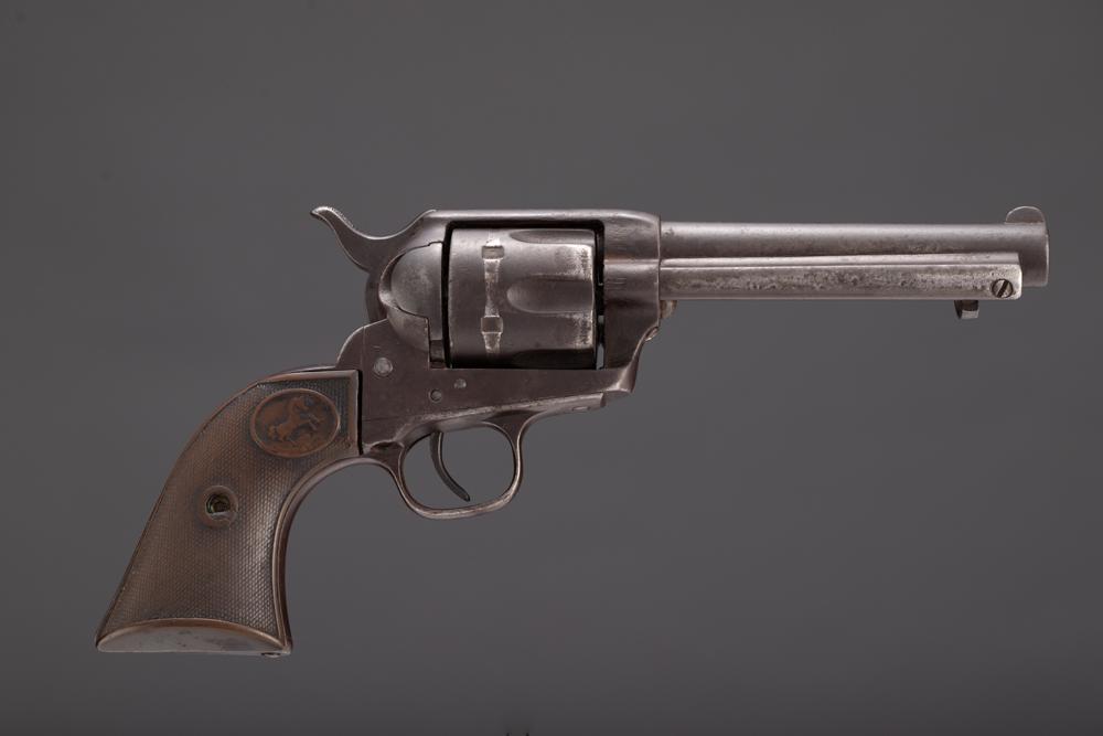 Antique Colt Single Action Army Revolver, SN 60025, manufactured circa 1880. This is a .44/40: Antique Colt Single Action Army Revolver, SN 60025, manufactured circa 1880. This is a .44/40 caliber, 6-shot revolver with a 4 15/16” barrel, blue finish and rubber stocks. The barrel was likel