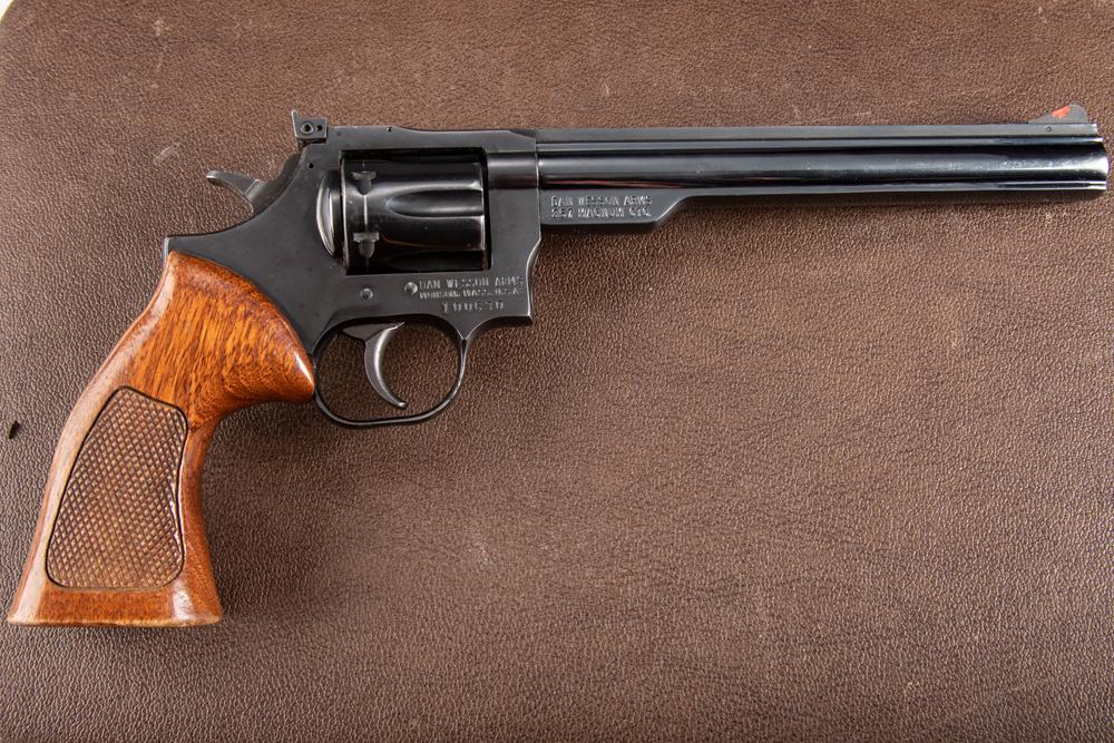 Dan Wesson Model 15-2 Double Action Revolver, .357 MAG caliber, SN 100630, blue finish, 8" barrel,: Dan Wesson Model 15-2 Double Action Revolver, .357 MAG caliber, SN 100630, blue finish, 8" barrel, overall finish is good with some light wear at muzzle, shows turn line. Revolver will be sold in a ha