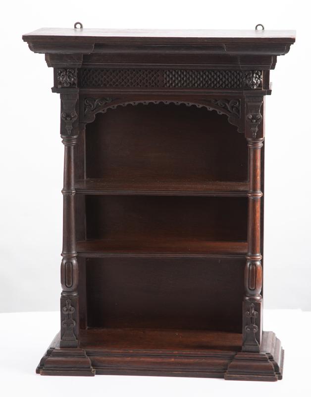 Ornate antique oak Hanging Shelf with full columns and lion heads on front, circa 1890-1900, fancy: Ornate antique oak Hanging Shelf with full columns and lion heads on front, circa 1890-1900, fancy molding and step out base, measures 28" T x 21" W x 9" D, in original finish.