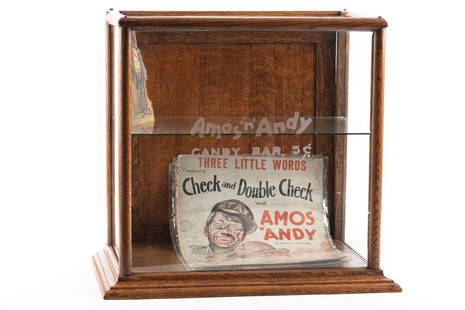 Antique quarter sawn oak & glass Display Case etched on front glass "Amos 'n' Andy Candy Bar 5c",: Antique quarter sawn oak & glass Display Case etched on front glass "Amos 'n' Andy Candy Bar 5c", circa 1900-1920, measures 16" T x 10 3/4" D x 17 1/4" W, in excellent finish and condition. Case will