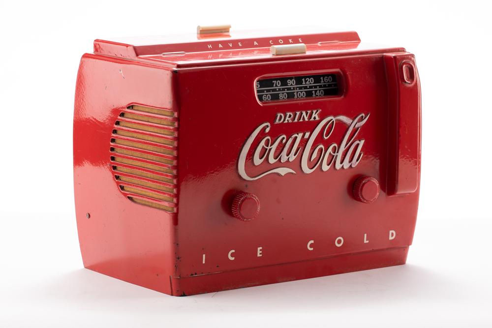 Vintage Coca-Cola Radio in playing order, shaped like a reach-in cooler, complete with antenna,: Vintage Coca-Cola Radio in playing order, shaped like a reach-in cooler, complete with antenna, measures 10" T x 12" W x 8" D. In good condition showing some touch ups to the paint. BUDDY KING COLLECT